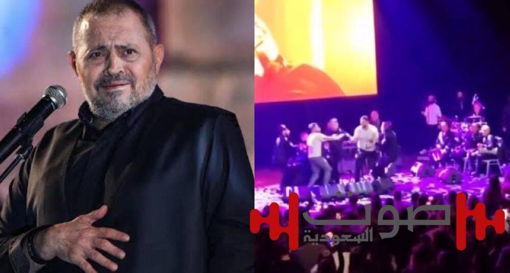 لحظة محرجة على المسرح.. معجبة تحتضن جورج وسوف في السويد